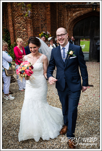 Bride and Groom getting covered