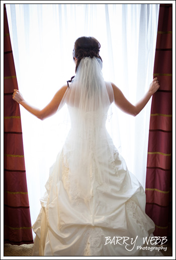 Window pose at Castle Cooling Barn in Kent - Wedding Photography