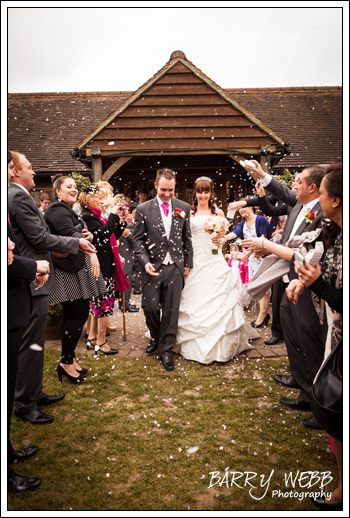 The convetti shots at Castle Cooling Barn in Kent - Wedding Photography