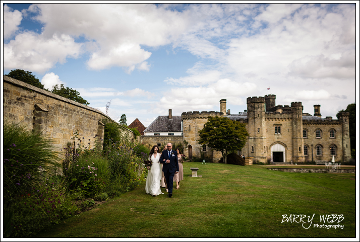 The bridal party arrive