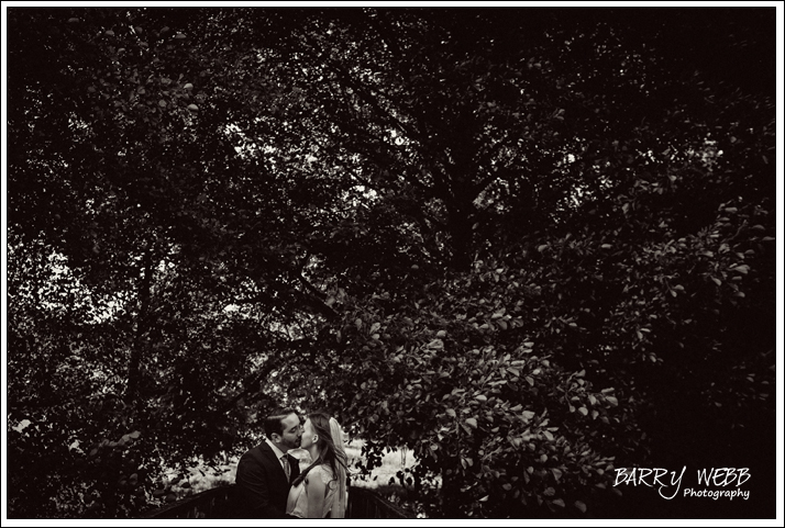 The Bride and Groom share a kiss at Chiddingstone Castle