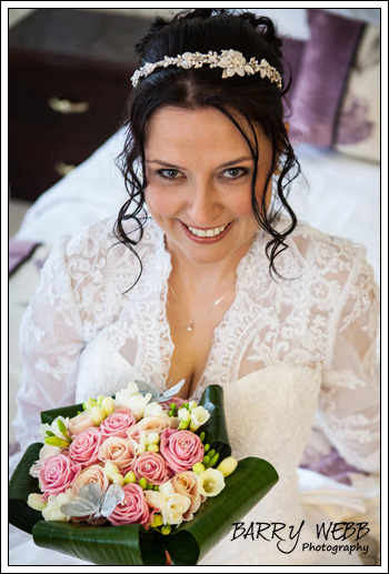 Posing on the bed at Hadlow Manor Hotel in Kent