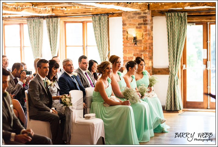 The Bridemaids looking on