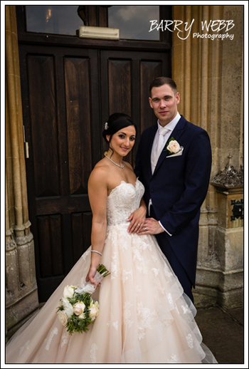 The Bride and Groom at the entrance of Mountains Counrty House