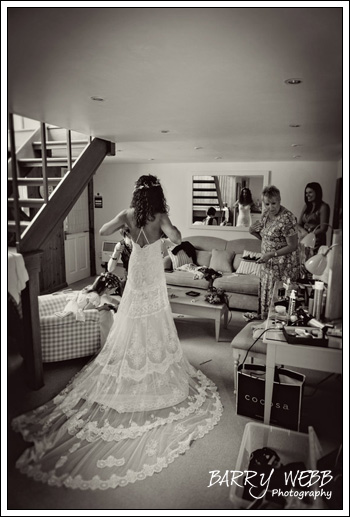 Final ajustments the the dress - South Farm in Hertfordshire - Wedding Photography