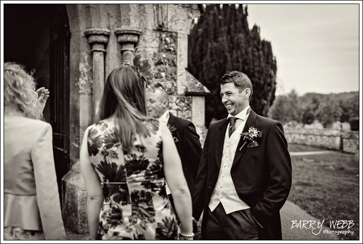 Greeting Guests - Wedding at St Giles' Church in Shipboourne