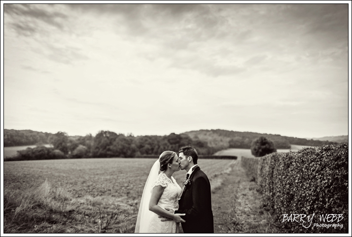 The Bride and Groom in Black and White - Wedding at St Giles' Church in Shipboourne